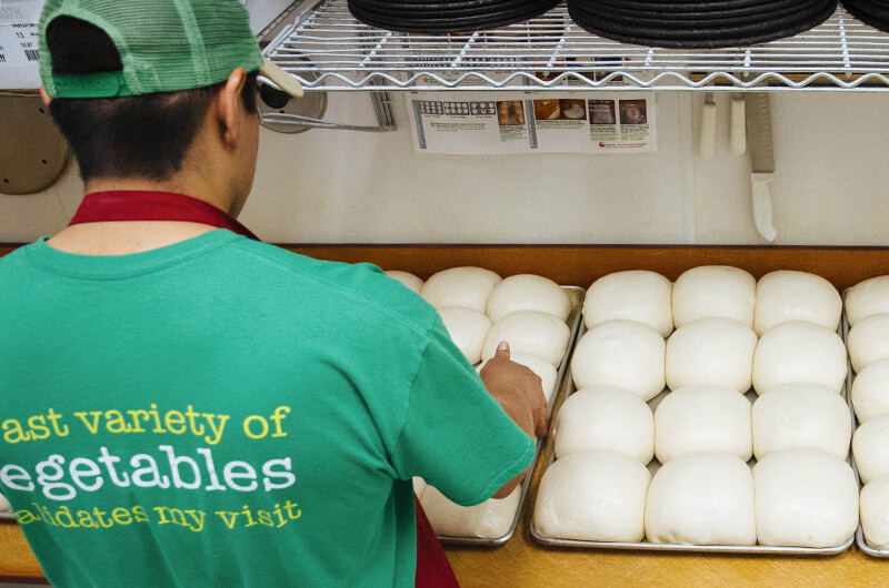 Peter Piper Pizza Pizza Dough Carefully Handled by a Peter Piper Pizza Chef